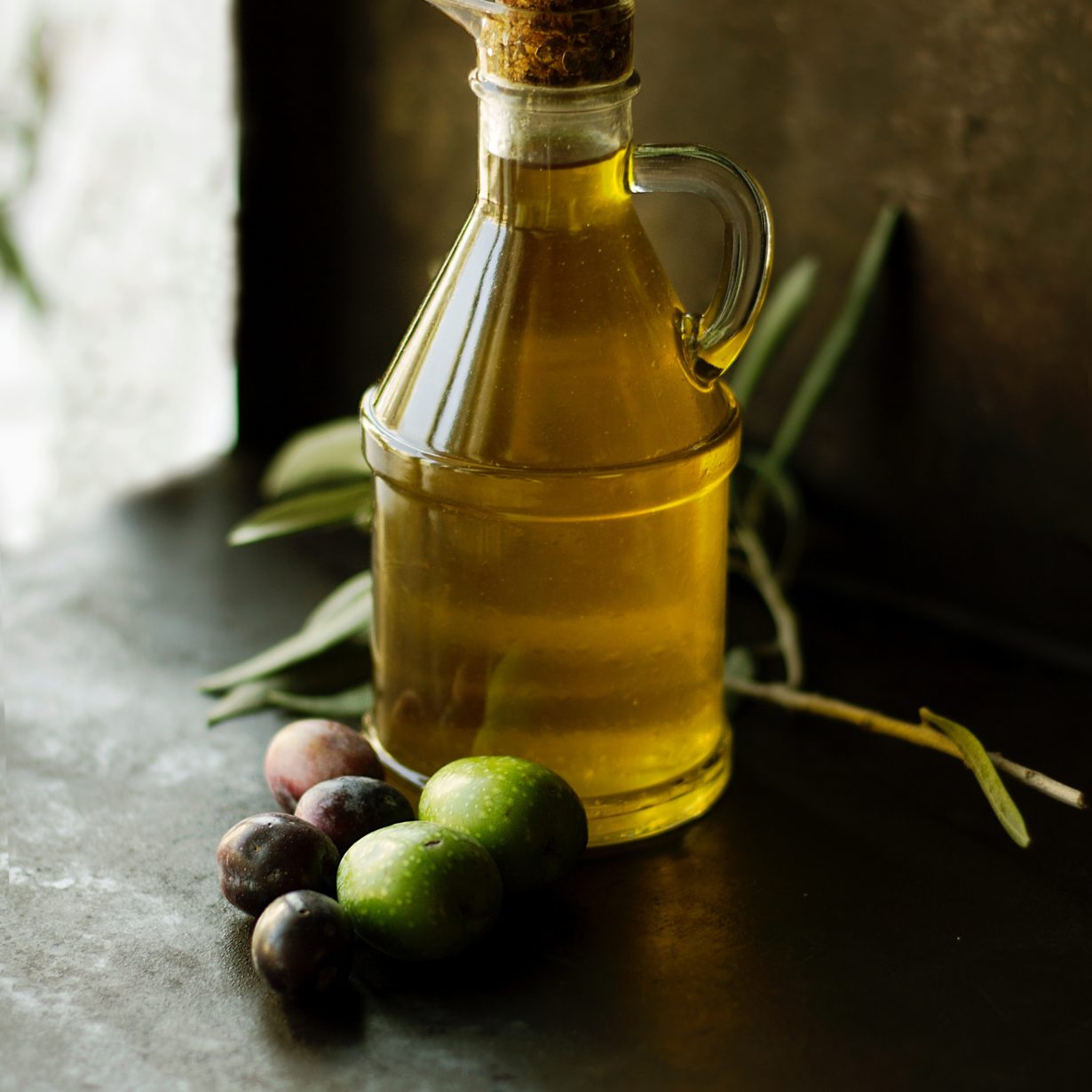 Oil in jar with natural food items by roberta-sorge-unsplash